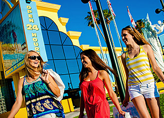 Three women walking with shopping bags